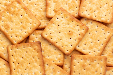 Wall Mural - Crushed dry cracker cookies isolated on white background.