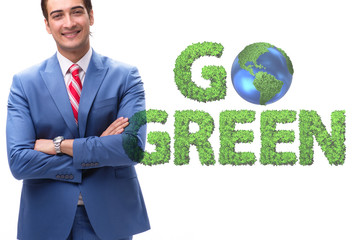 Green energy anc ecology concept with businessman