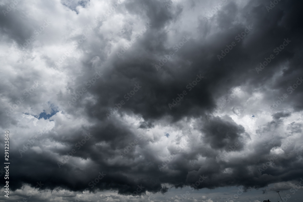 dark storm clouds with background,Dark clouds before a thunder-storm. - obrazy, fototapety, plakaty 