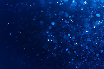 Wall Mural - abstract blue bokeh defocus glitter blur background.