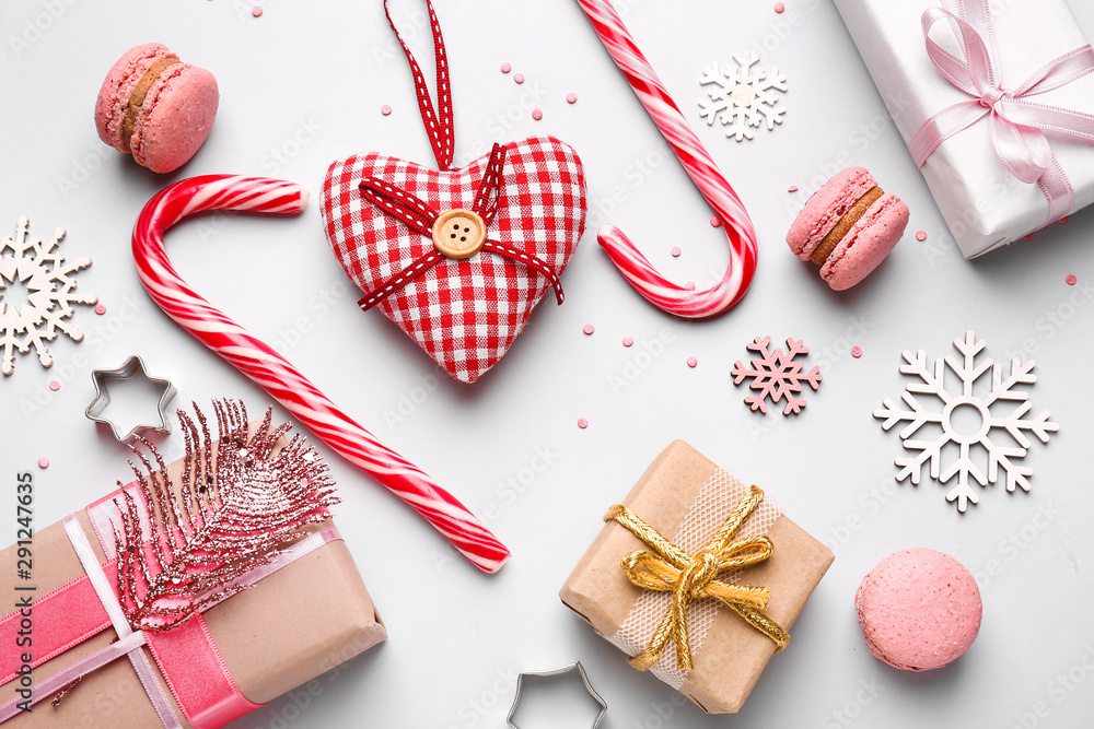 Beautiful composition with Christmas decor on light background