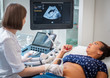 © Nejron Photo - Pregnant woman on utltrasonographic examination at hospital