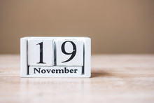 19 November Calendar And Mustache On Wood Table Background. Father, International Men Day, Prostate Cancer Awareness And World Cancer Day Concept