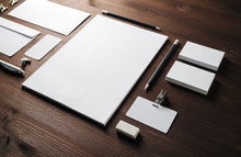 Photo Of Blank Corporate Stationery Set On Wood Table Background. Template For Branding Design.