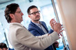 © ivanko80 - Businessman giving presentation to colleagues