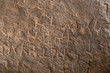 Close up of Inscriptions of Emperor Ashoka on rock boulder at Maski, Raichur, India