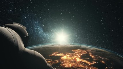 Wall Mural - astronaut against realistic planet earth with illuminated mainlands hiding bright sun backside view.
