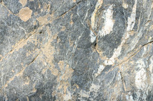 Background From Surface Of Gray Stone Rock