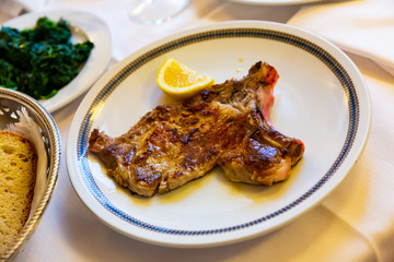 Italian dish - traditional veal chop with lemon