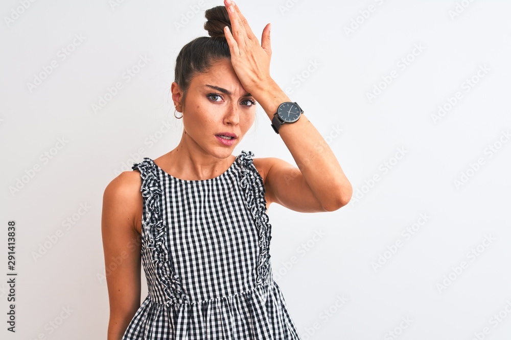 Beautiful woman with bun wearing casual dresss standing over isolated ...