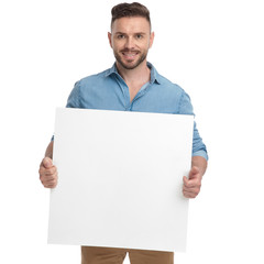 Sticker - casual man standing with billboard on hands happy