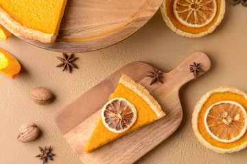 Composition with tasty pumpkin pie on table