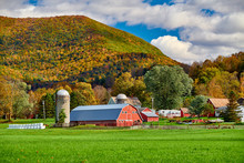 Farm With Red Barn And Silos At Sunny Autumn Day In West Arlington, Vermont, USA