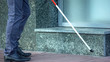 © motortion - Blind man finding obstructions with cane, difficulties for handicapped in cities
