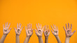 Welcome written palms on orange background, community togetherness, invitation