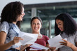 © ReeldealHD images - Female High school students opening their exam results