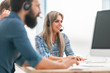 © yurolaitsalbert - close up. a group of employees in a headset sitting at a Desk