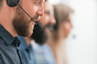 © yurolaitsalbert - close up. professional call center employee in the workplace.