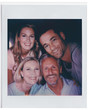 © Monkey Business - Vintage Instant Film Print Of Senior Parents And Adult Offspring Posing For Selfie