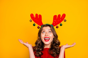 Poster - Pretty lady looking on head horns overjoyed with xmas decor wear knitted jumper isolated yellow background