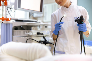 Doctor doing endoscopy examination in office stock photo