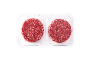 burger meat packaged in plastic isolated on white background