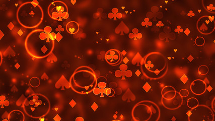 Poker abstract casino bokeh pattern of chaotic playing cards icons in space.