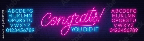 Fotografía Neon sign congrats you did it on a dark background