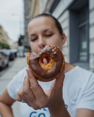 Girl eating cronut