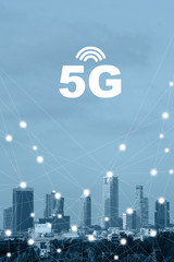 Modern city with wireless network connection concept. Communication network concept 5G smart city on blue background. Blue tone city scape and network connection concept.