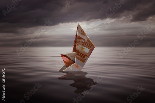 Fotomural Sinking a little boat made with a euro bill