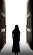 © Thicha - woman standing into the light through open big door