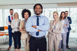 © Mediteraneo - Group of happy business people and company staff in modern office, representig company.Selective focus.