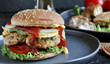© shabbydecor - Brain Burger. Fried brains beef, calf or sheep are fried in deep fried as a cutlet in a burger. shows a sandwich in a section. fashionable exotic food. Zombie food. weird food. hipster food