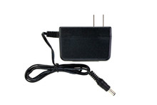 Image Of Black Electric Power Adapter Isolated On White Background. Computer Hardware.