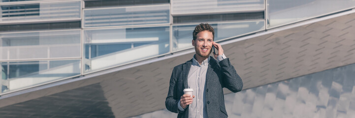 Wall Mural - young business man calling talking on the mobile phone on coffee break from office building outside.