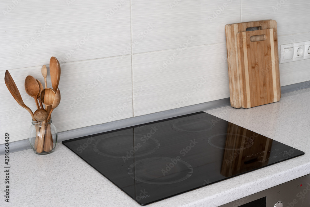 Kitchen with built in ceramic induction stove