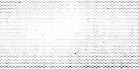 abstract halftone dotted background. grunge effect vector texture