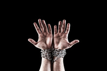 Two Hands In Chains Isolated On Black Background With Clipping Path