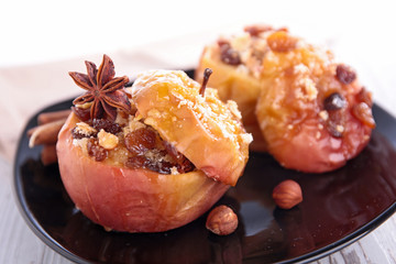 Wall Mural - baked apples with dried fruits and spices