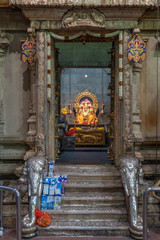 Wall Mural - Colourful statues of Hindu religious deities adorning at Sri Veeramakaliamman Temple