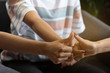 © montira - Hand thumb fist touching together in circle shap,show power of cooperation.