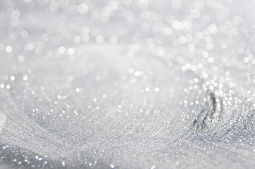  Abstract of Bright and sparkling bokeh background. silver and diamond dust bokeh blurred lighting from glitter texture