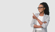 © Prostock-studio - Afro Office Girl Pointing Finger At Empty Space, Studio Shot
