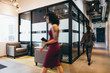 © Gerald Carter/Creative Flame - Direct view of women moving around in lobby