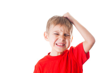 Wall Mural - Frustrated boy is tearing his hair out, isolated on white