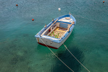 Moored Boat In The Port Of Kokkari In Samos, Greece.