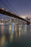 Fototapeta  - Brooklyn Bridge with Financial District at night with long exposure 
