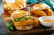 Breakfast biscuit sandwiches with fried chicken, traditional southern food