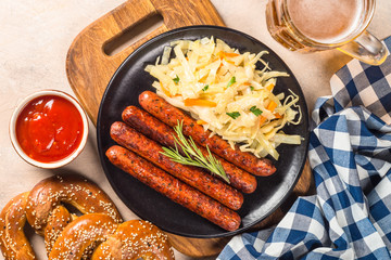 Wall Mural - Sausage, sauerkraut, bretzels and beer.